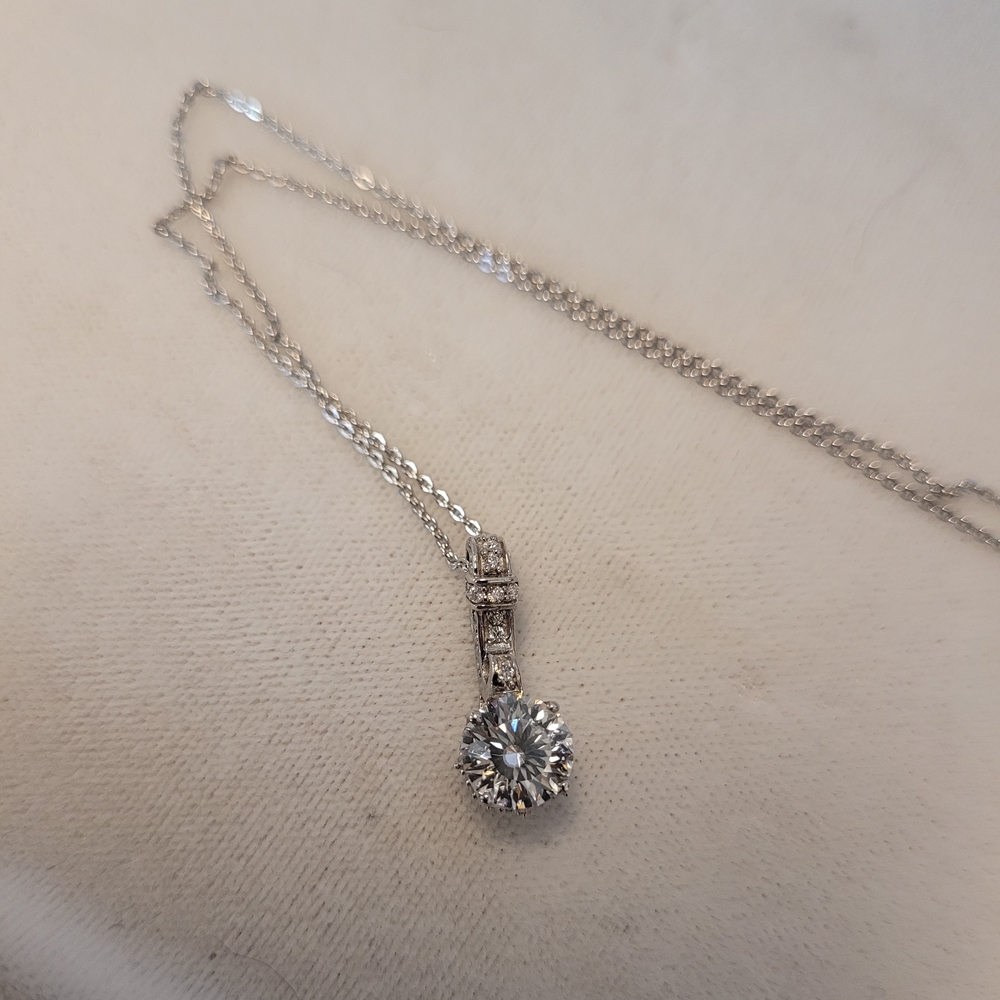 New In Box 1.6ct. Crisantemo Cut Genuine Moissanite Pendant Rhodium Over .925.